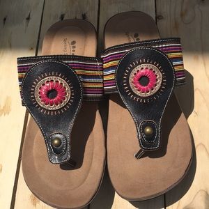 Spring step sandals